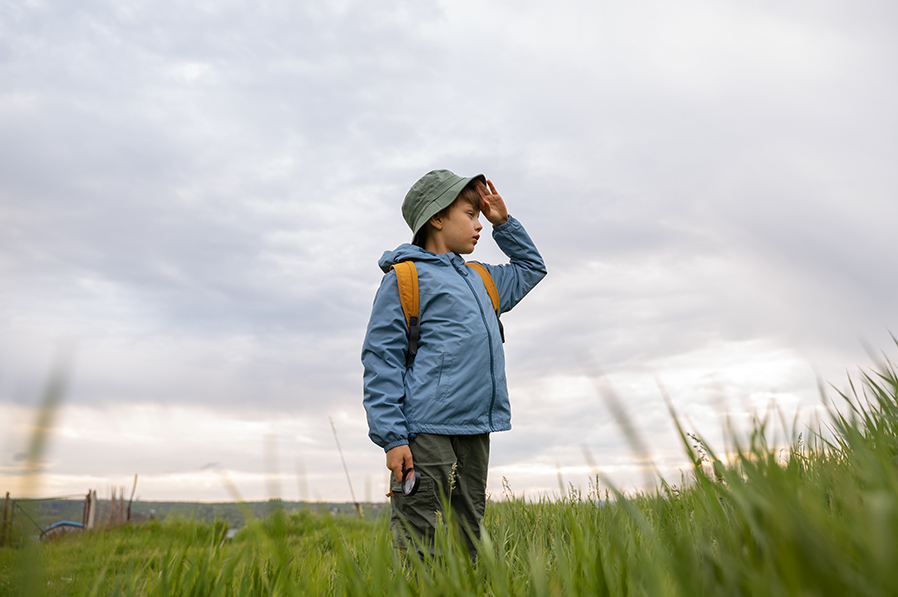 76 x 51 - side-view-kid-exploring-natural-environment solitary kid